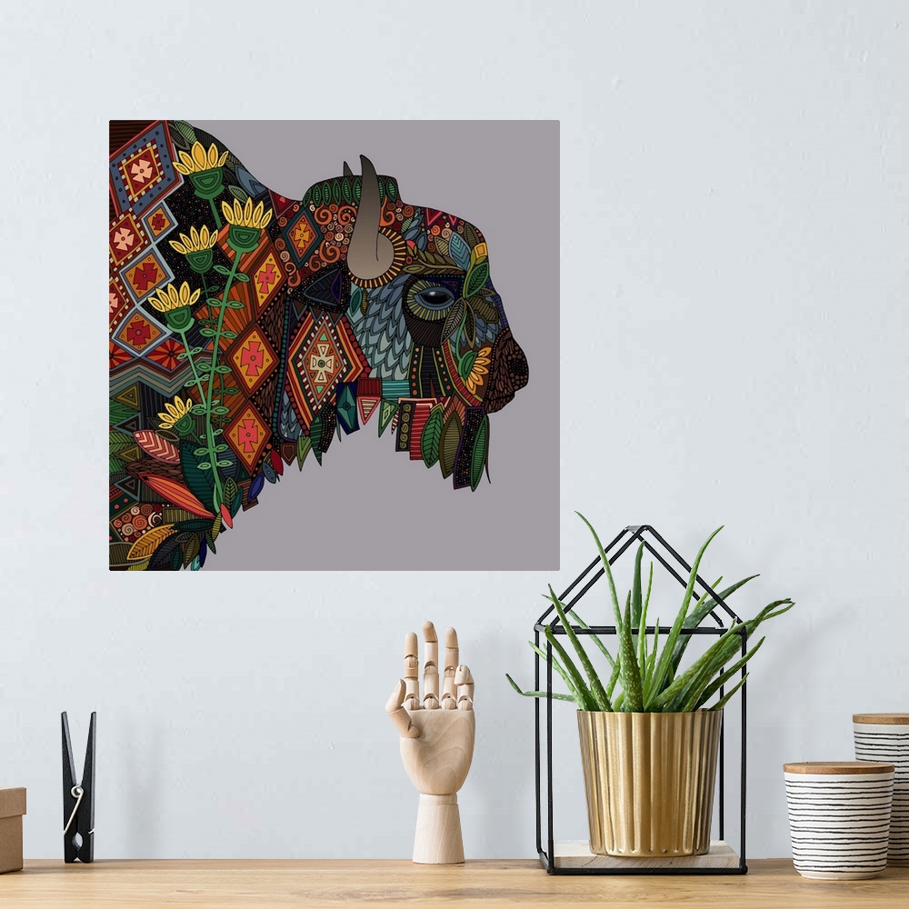 A bohemian room featuring Illustration of a buffalo with geometric patterns.