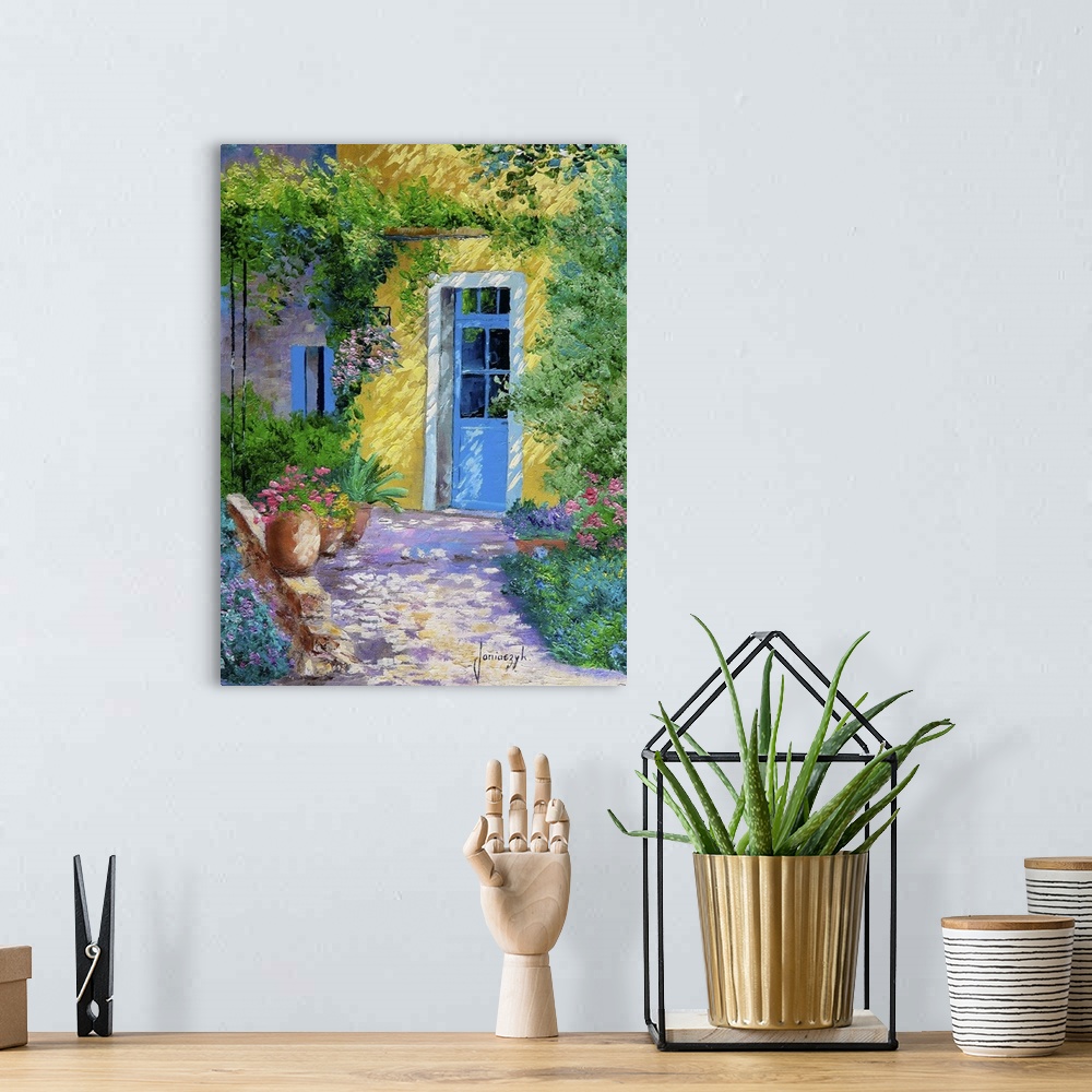 A bohemian room featuring Contemporary painting of a blue door surrounded by blooming flowers and lush vines.