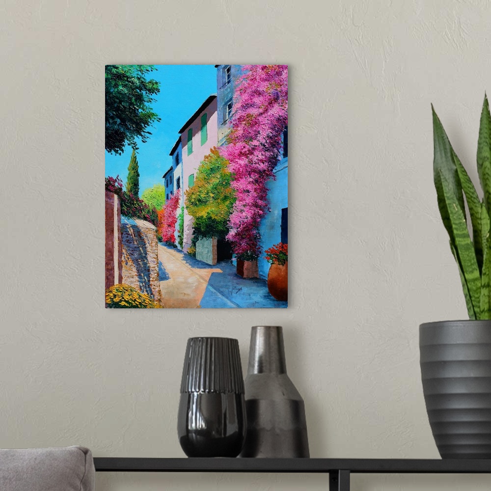 A modern room featuring Contemporary painting of a rural village covered in bright flowers.