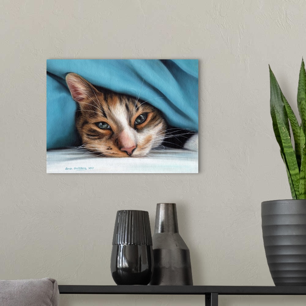 A modern room featuring Oil painting on canvas of a domestic cat under a blanket.