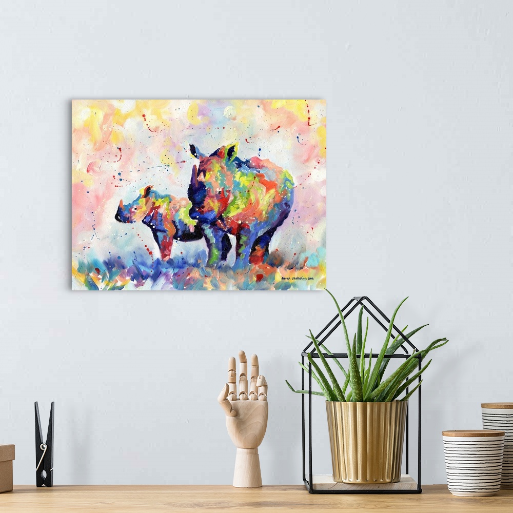 A bohemian room featuring Rhino and baby in rainbow colors painted in oil paints on canvas.