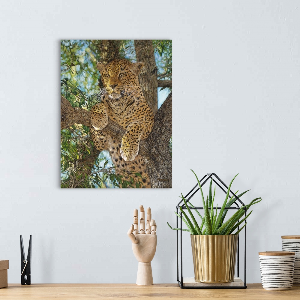 A bohemian room featuring Contemporary painting of a leopard laying in a tree.