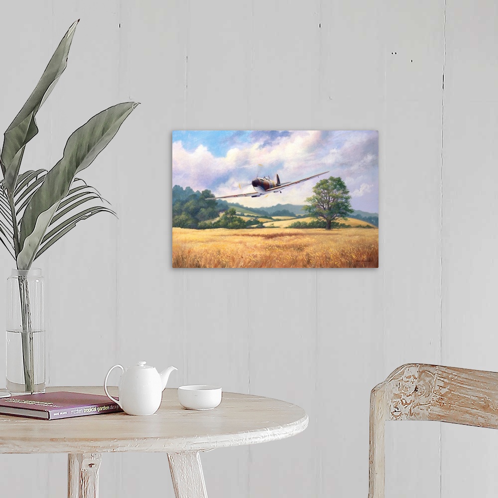 A farmhouse room featuring Painting of a vintage military fighter plane flying low over a rural landscape.