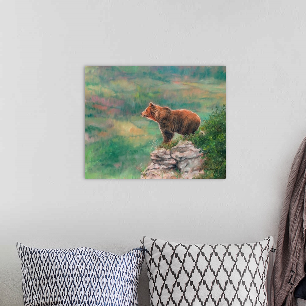 A bohemian room featuring Contemporary painting of a brown bear atop a rocky overlook.