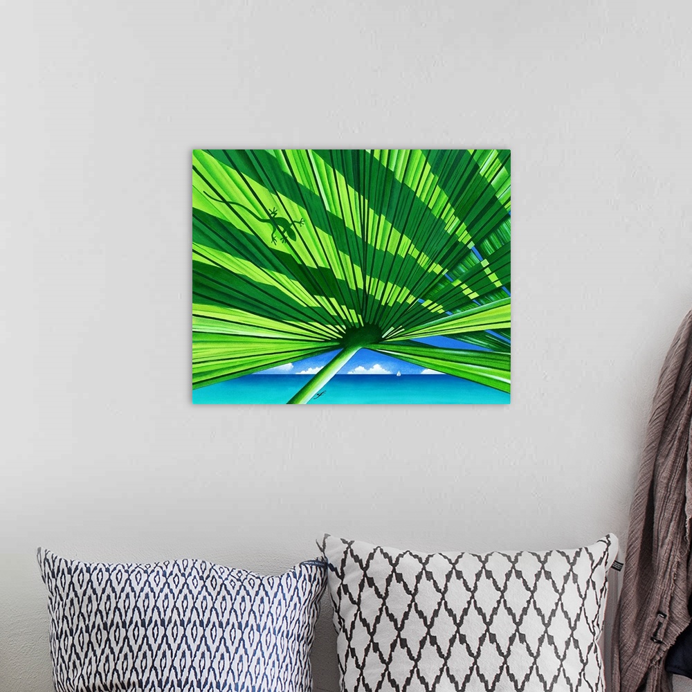 A bohemian room featuring Tropical themed artwork of a large lush looking palm frond with the silhouette of a  lizard on th...