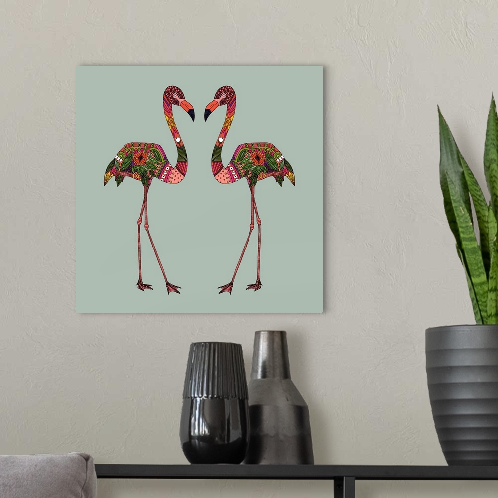 A modern room featuring A pair of pink flamingos with colorful patterns.