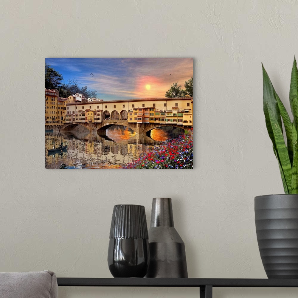 A modern room featuring A landscape picture of a bridge in Italy that is reflected in the water below with a canoe rowing...