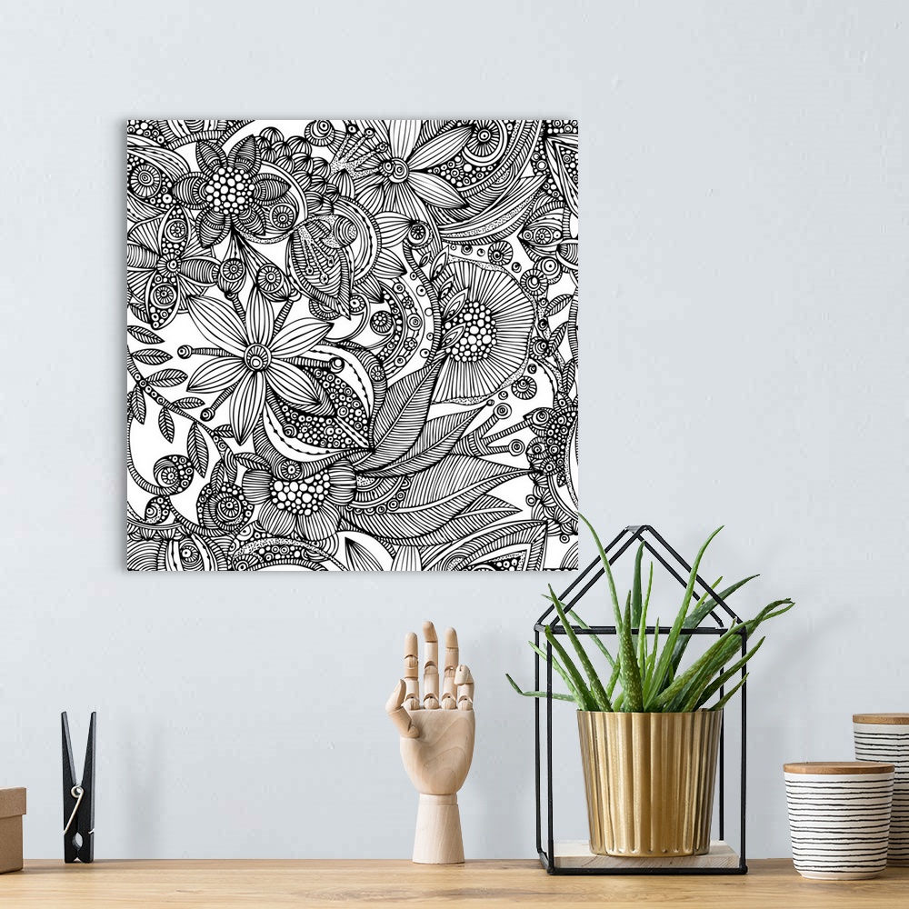 A bohemian room featuring Contemporary line art of intricately patterned flowers and nature designs against a white backgro...
