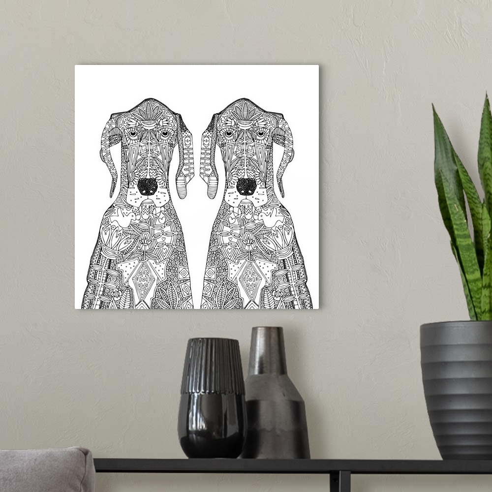 A modern room featuring Black and white line art of two identical great dane dogs with images in the line work.