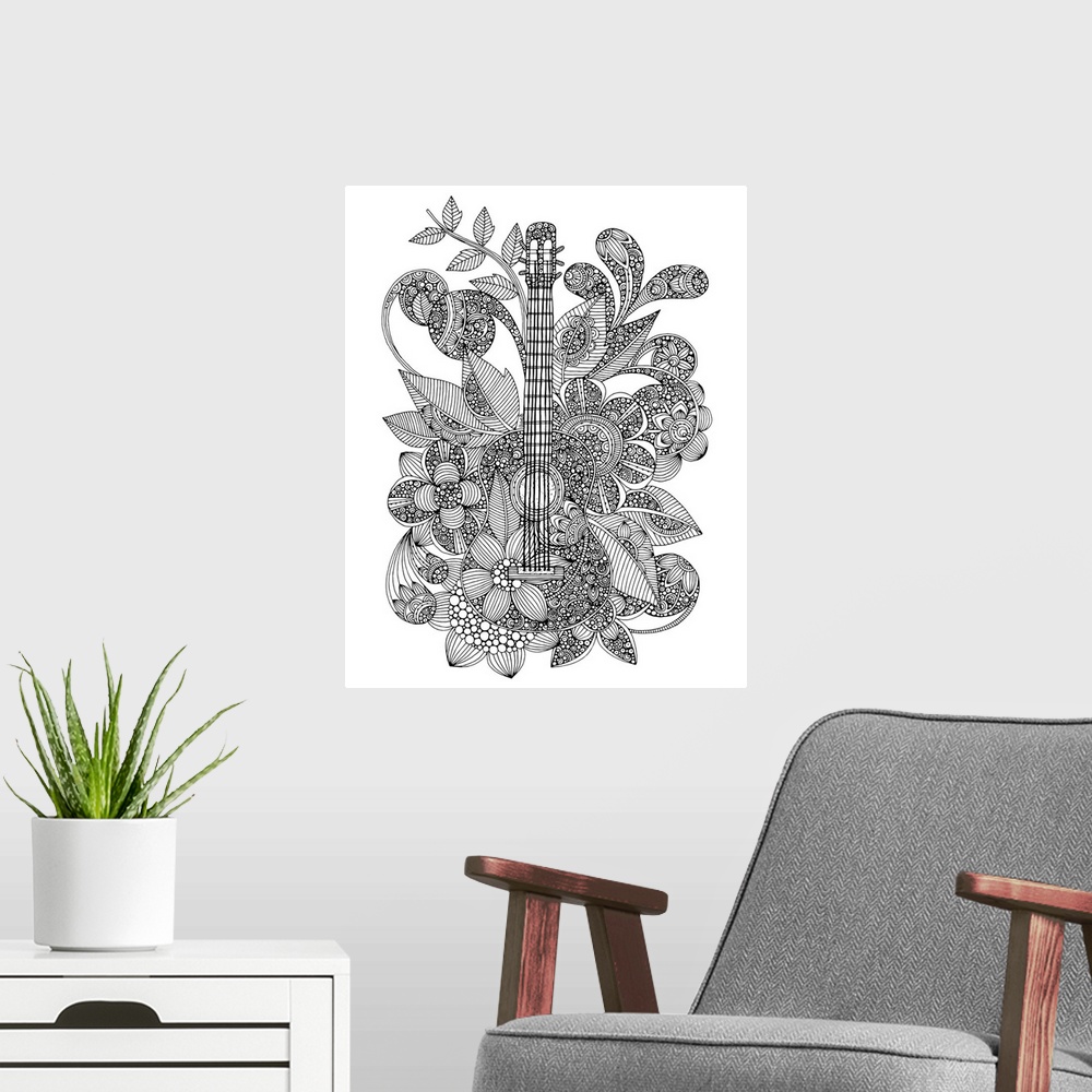 A modern room featuring Black and white line art of a guitar surrounded by flowers and vines.