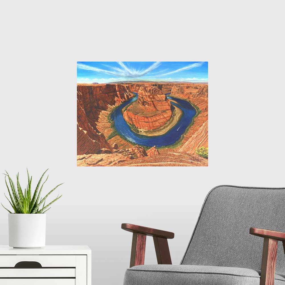 A modern room featuring Contemporary artwork of a large river running through a desert canyon.