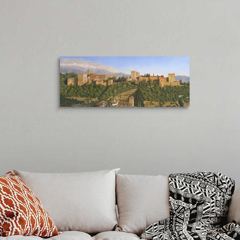 A bohemian room featuring Contemporary artwork of a village surrounded by a mountainous valley.