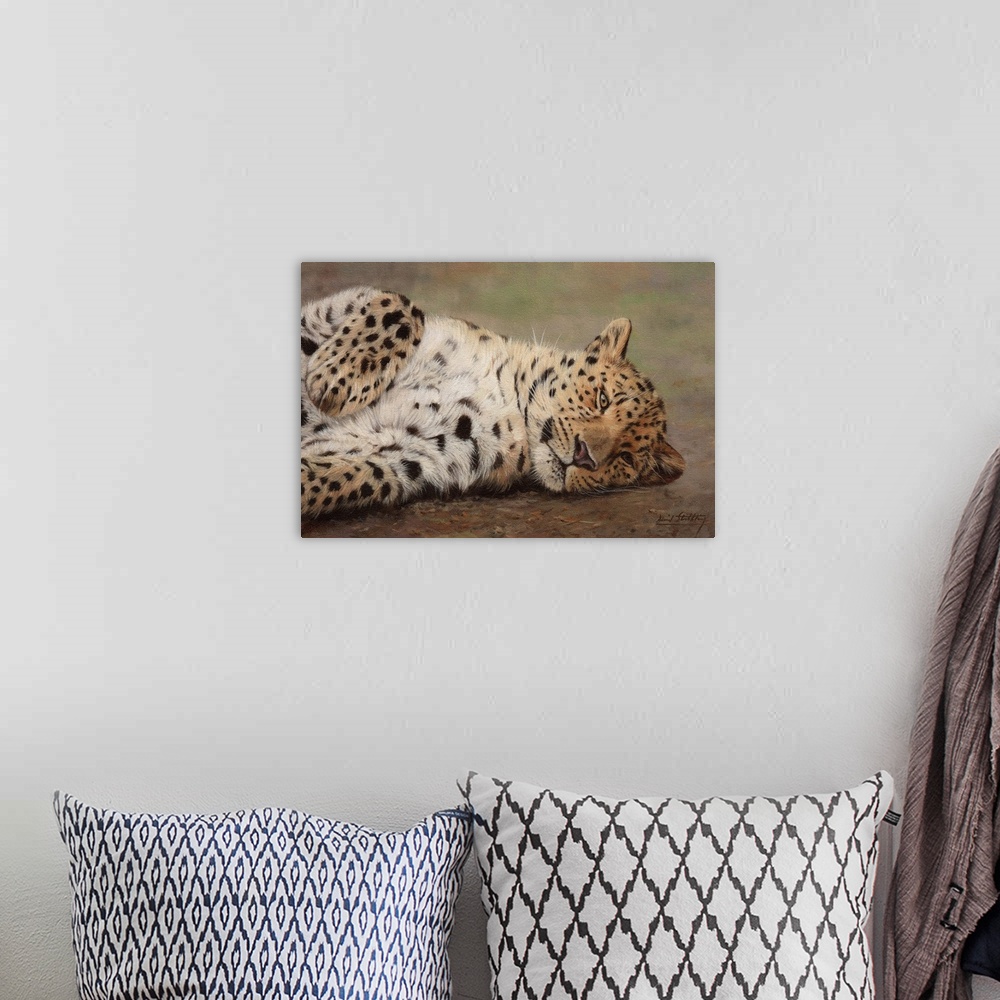 A bohemian room featuring Contemporary painting of a leopard resting playfully on the ground.