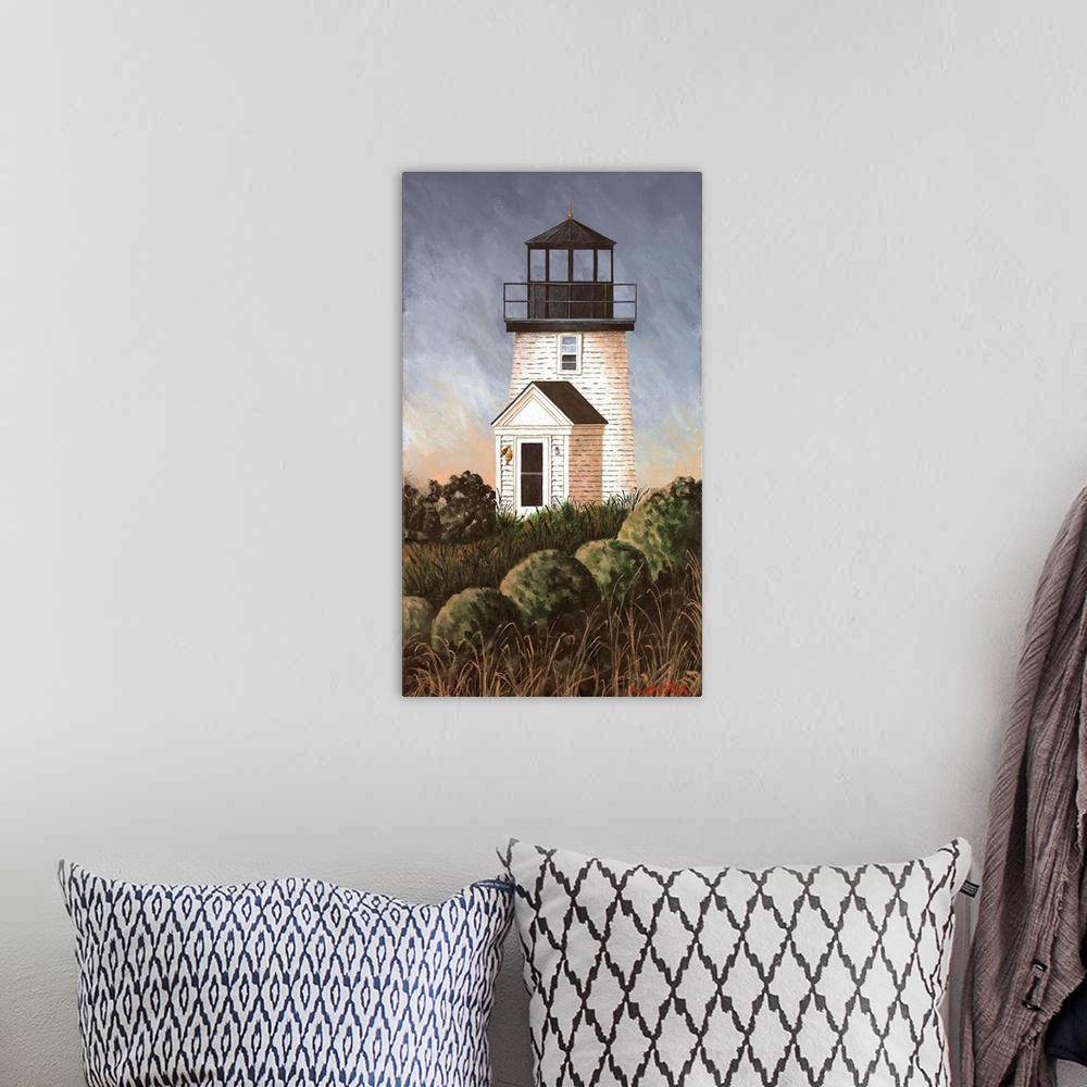 A bohemian room featuring Americana scene of a white lighthouse in Cape Cod, Massachusetts.