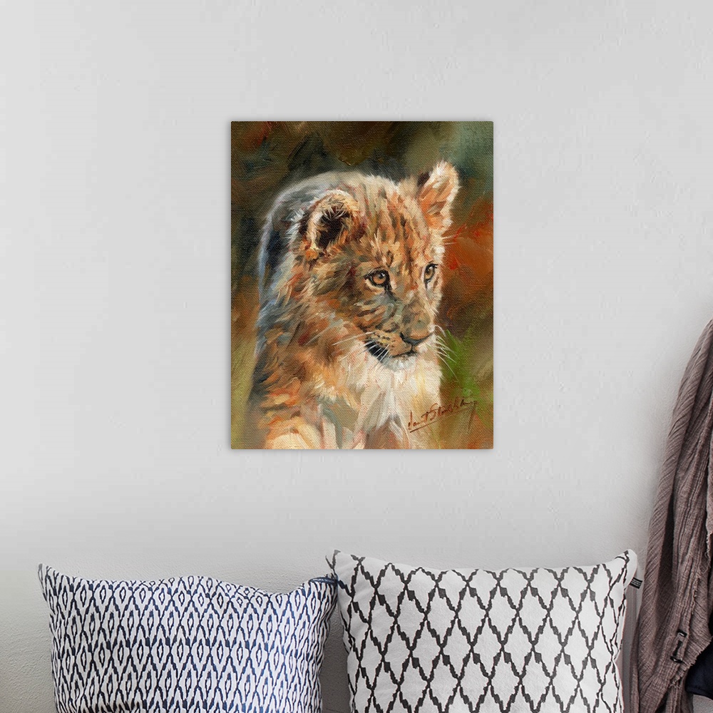 A bohemian room featuring Contemporary painting of a lion cub.