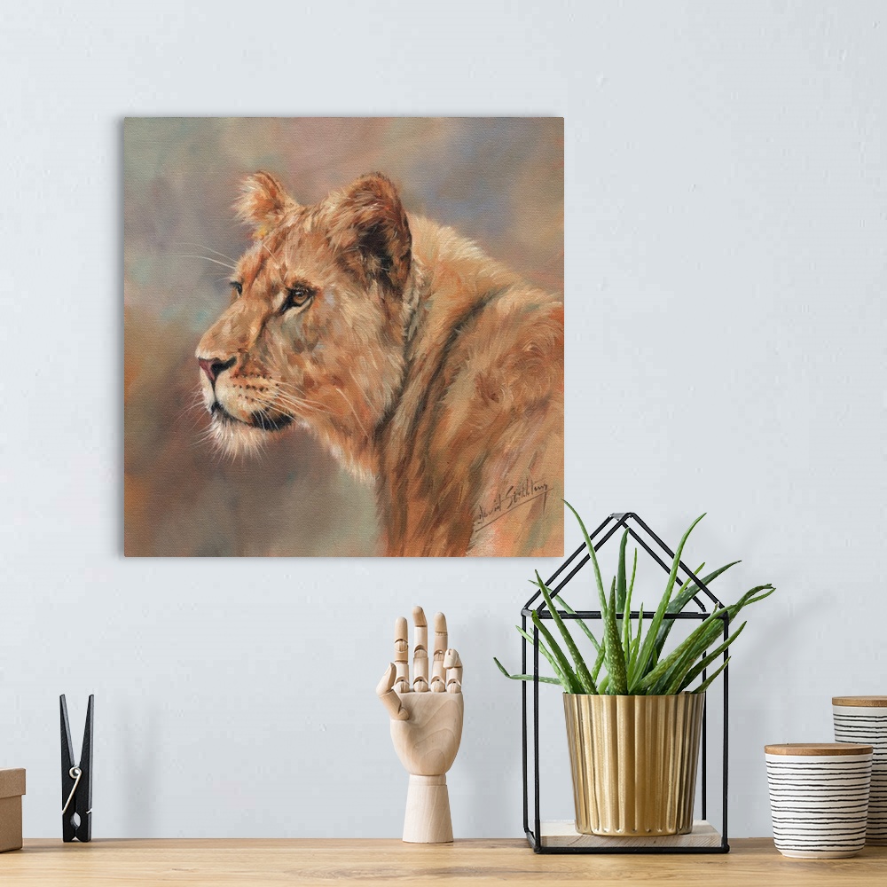 A bohemian room featuring Contemporary painting of a female lion.