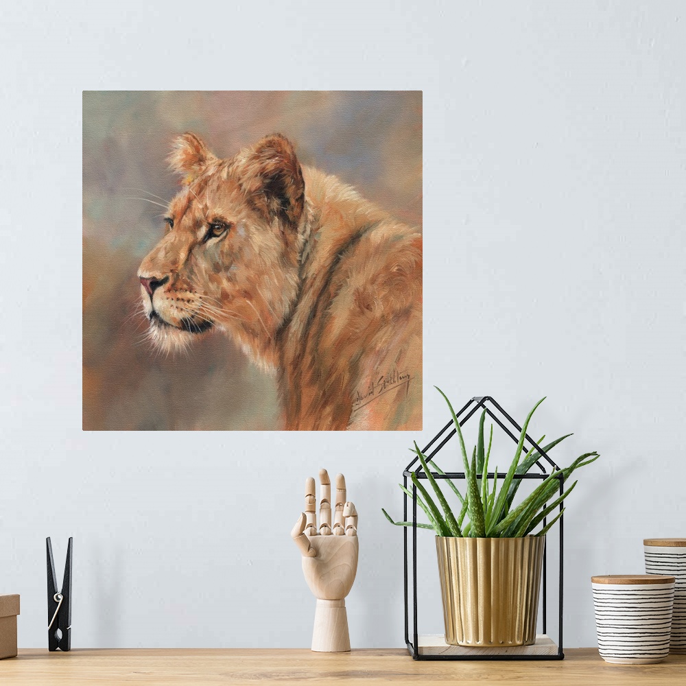 A bohemian room featuring Contemporary painting of a female lion.