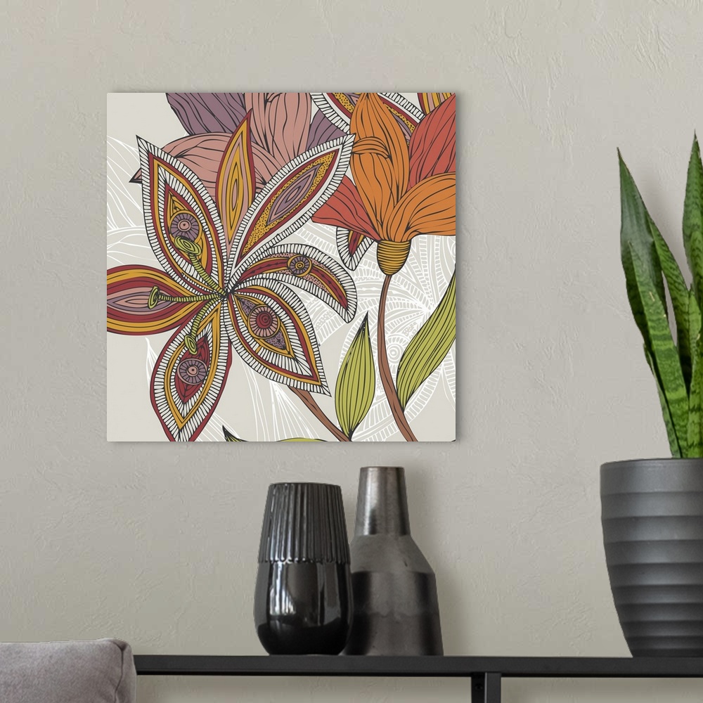 A modern room featuring Square abstract painting on canvas of brightly colored flowers outlined in black.