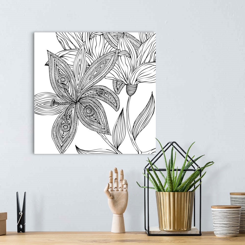 A bohemian room featuring Contemporary line art of a big intricately designed flower with other flowers against a white bac...