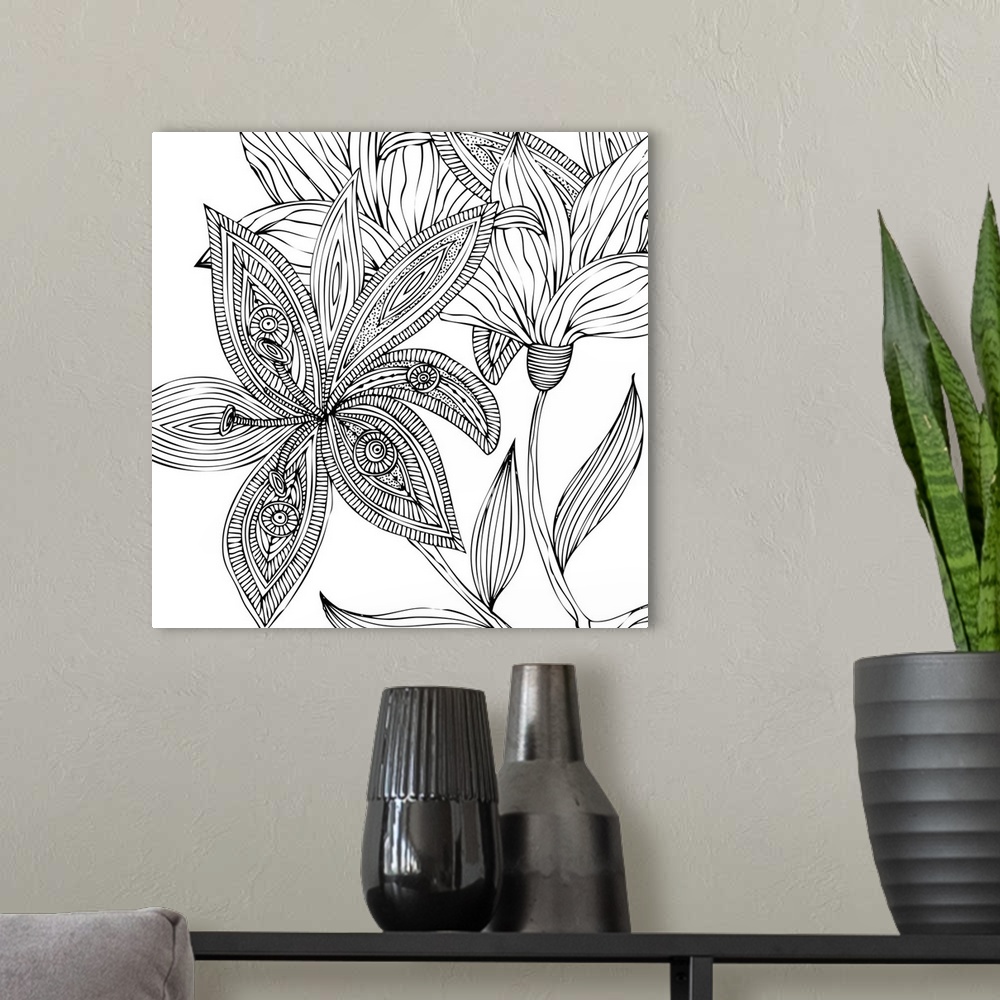 A modern room featuring Contemporary line art of a big intricately designed flower with other flowers against a white bac...