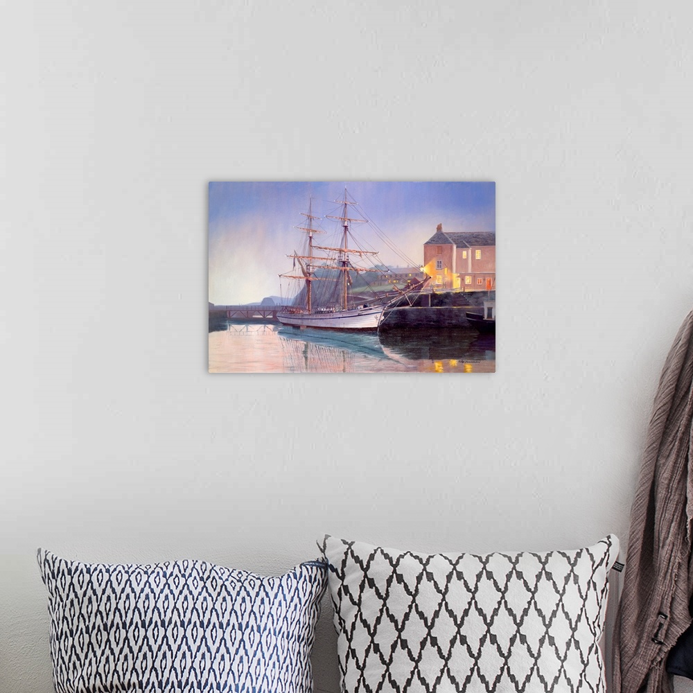 A bohemian room featuring Painting of of an old naval vessels resting on the shore.