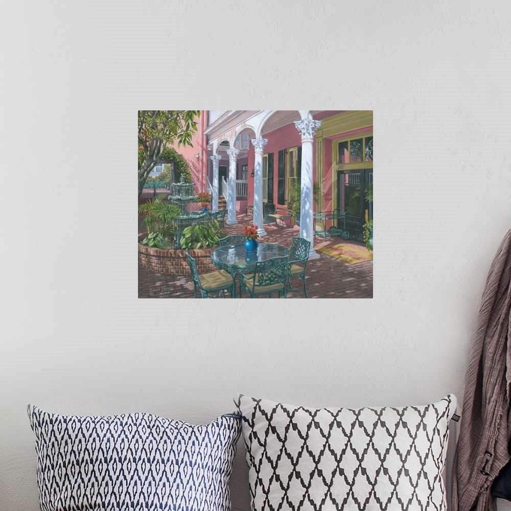 A bohemian room featuring Contemporary artwork of a courtyward garden, with a table and chairs.