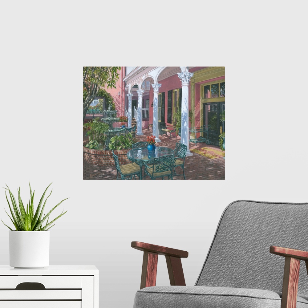 A modern room featuring Contemporary artwork of a courtyward garden, with a table and chairs.