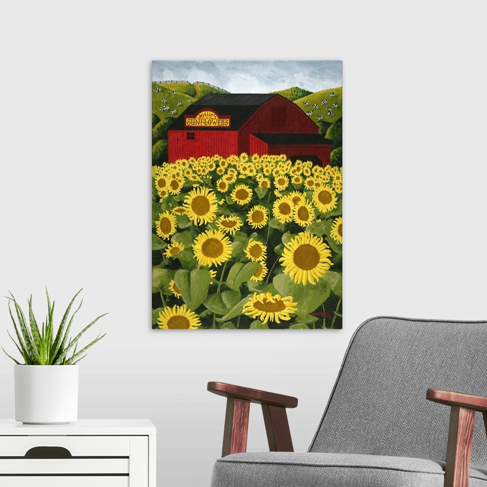 A modern room featuring Americana scene of a big red barn in a sunflower field.
