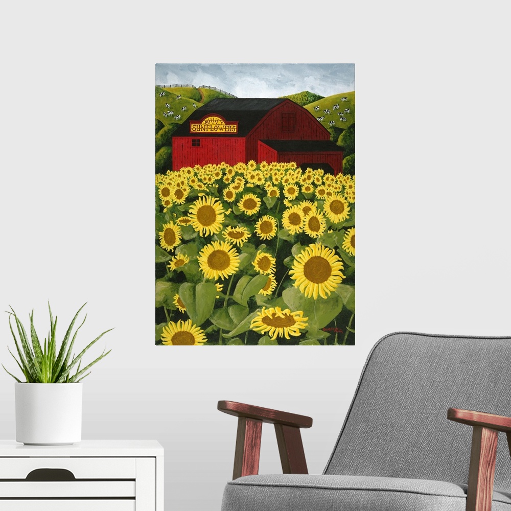 A modern room featuring Americana scene of a big red barn in a sunflower field.