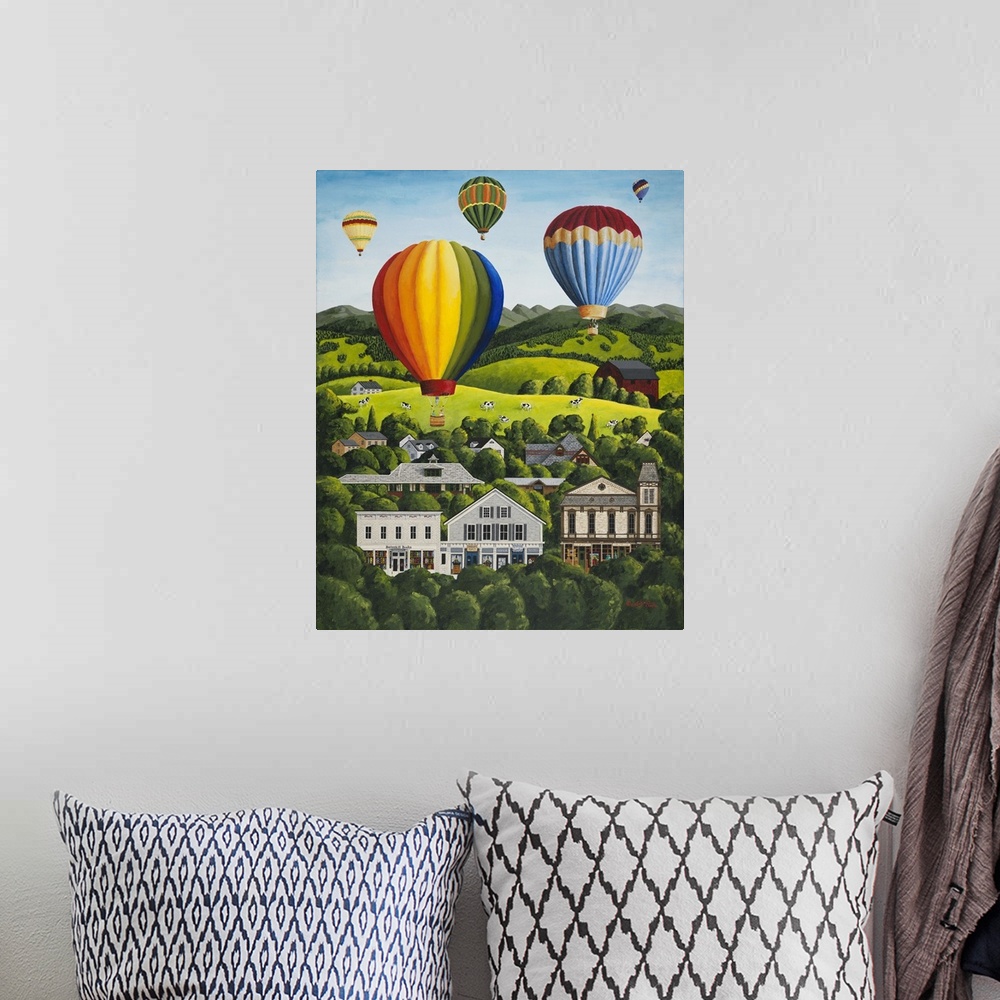 A bohemian room featuring Colorful hot air balloons floating above a hillside town.