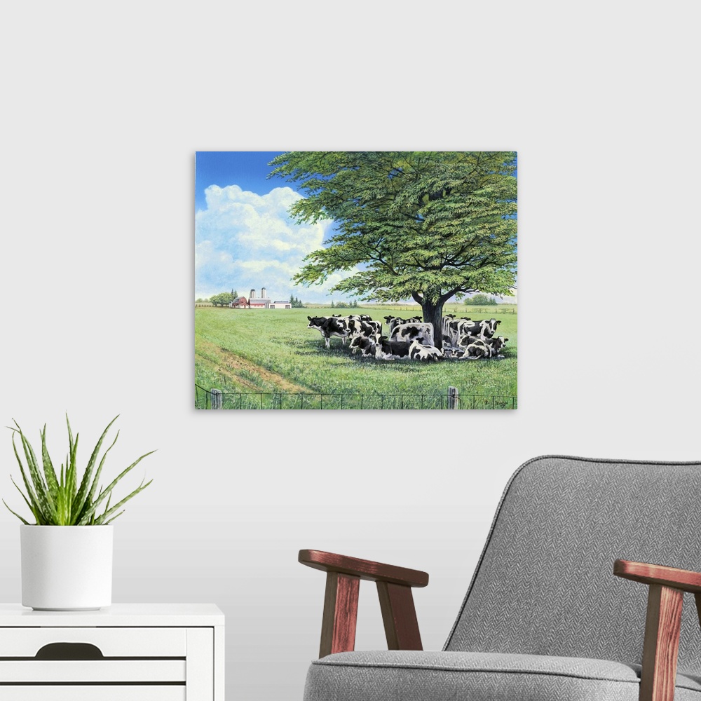 A modern room featuring Contemporary painting of a herd of cows under the shade of a lone tree in a field.