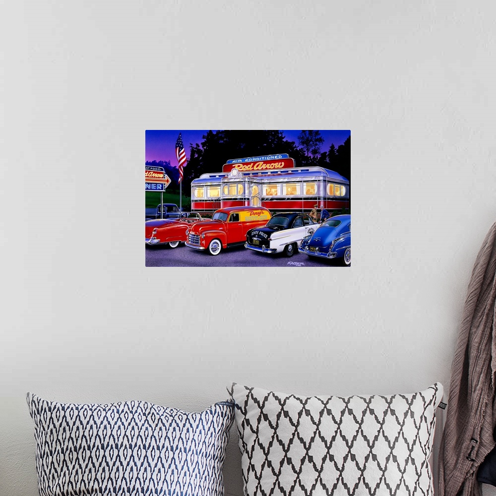 A bohemian room featuring Horizontal artwork on a large canvas of an old style trolley car diner in the early 1950s, lit up...
