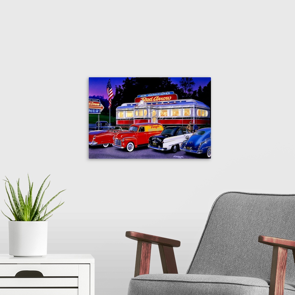 A modern room featuring Horizontal artwork on a large canvas of an old style trolley car diner in the early 1950s, lit up...