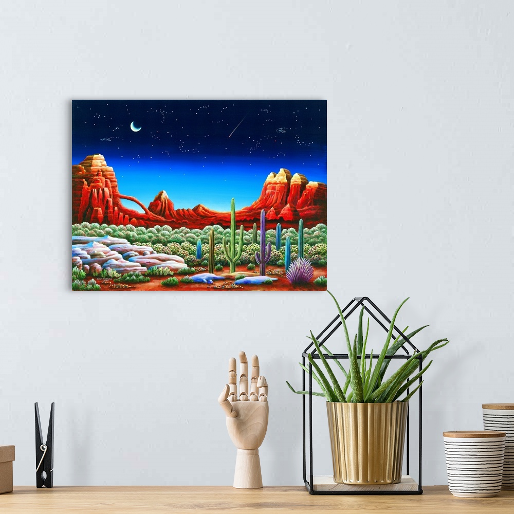 A bohemian room featuring Painting of a desert landscape under a starry night sky.