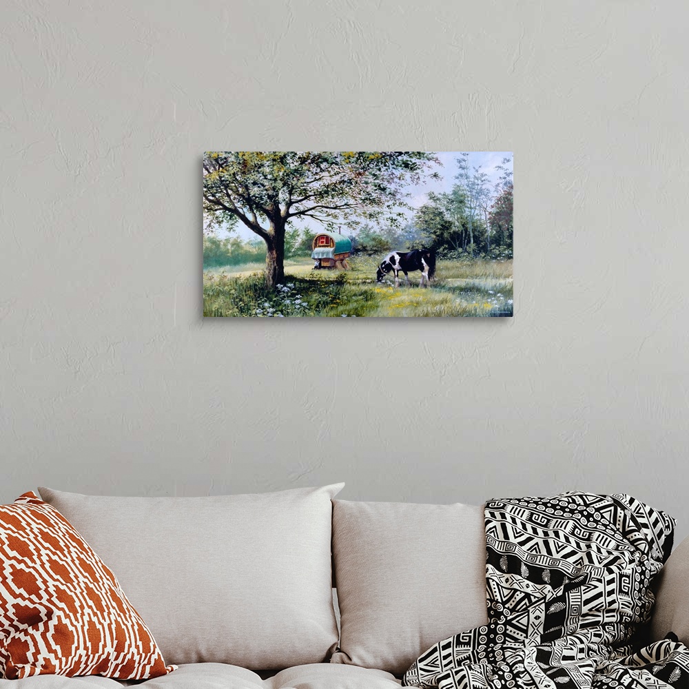 A bohemian room featuring Contemporary painting of a black and white horse grazing on lush greens near a gypsy train car.