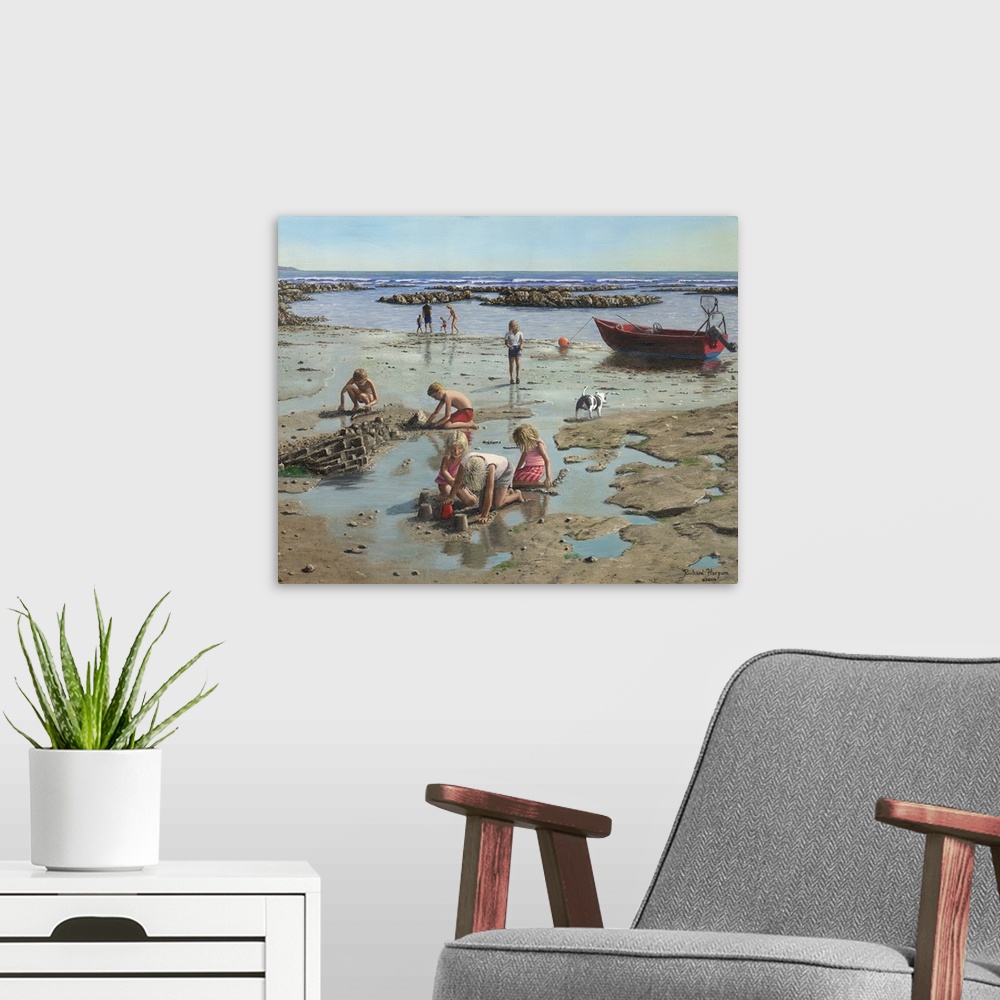 A modern room featuring Contemporary painting of children in the sand on a rugged looking beach.