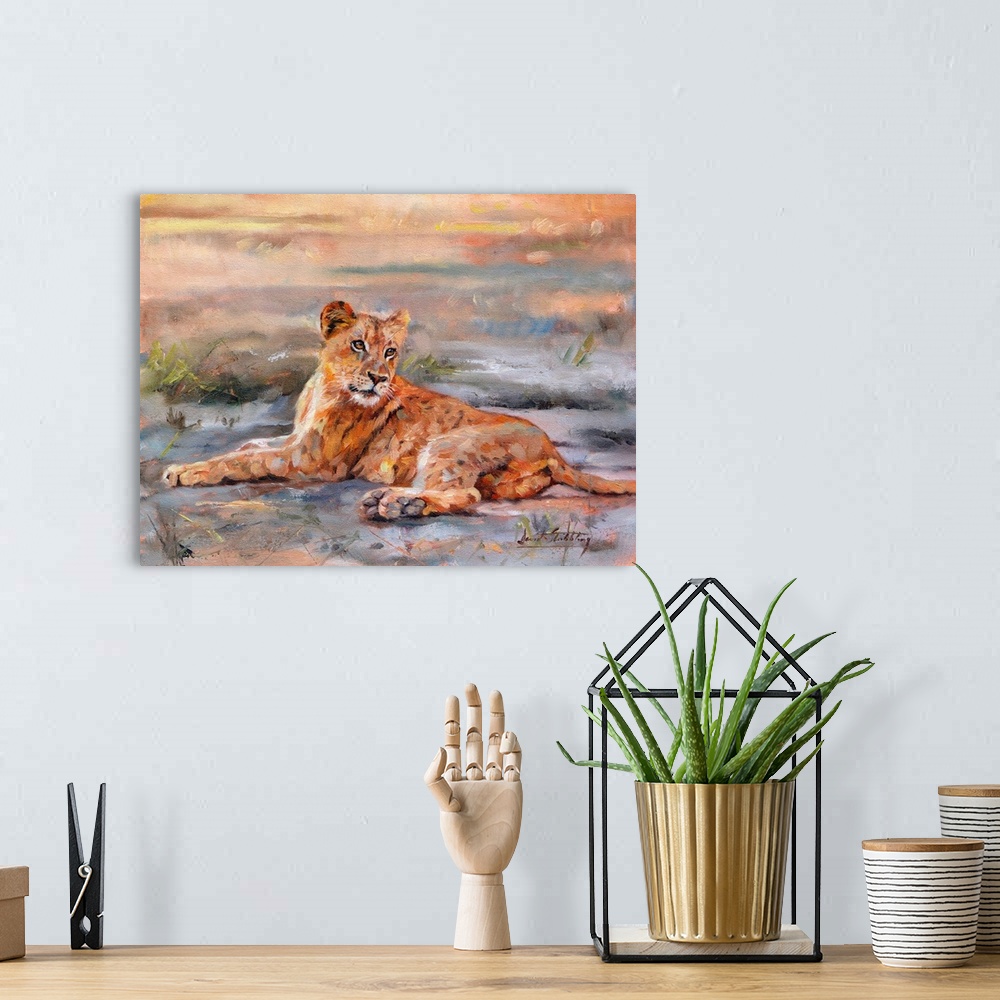 A bohemian room featuring Contemporary painting of a lioness laying on the ground.