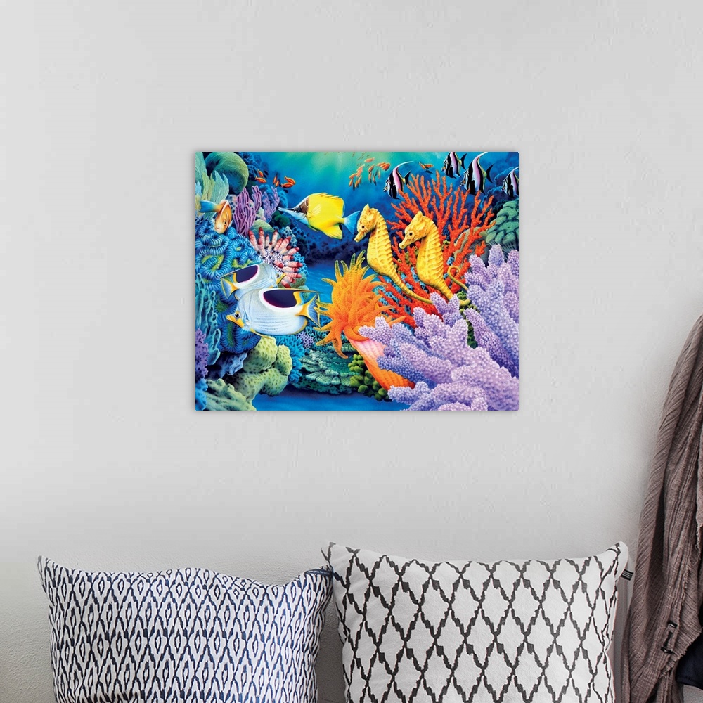 A bohemian room featuring Bright and colorful painting of underwater sea life including a school of fish and coral reef.