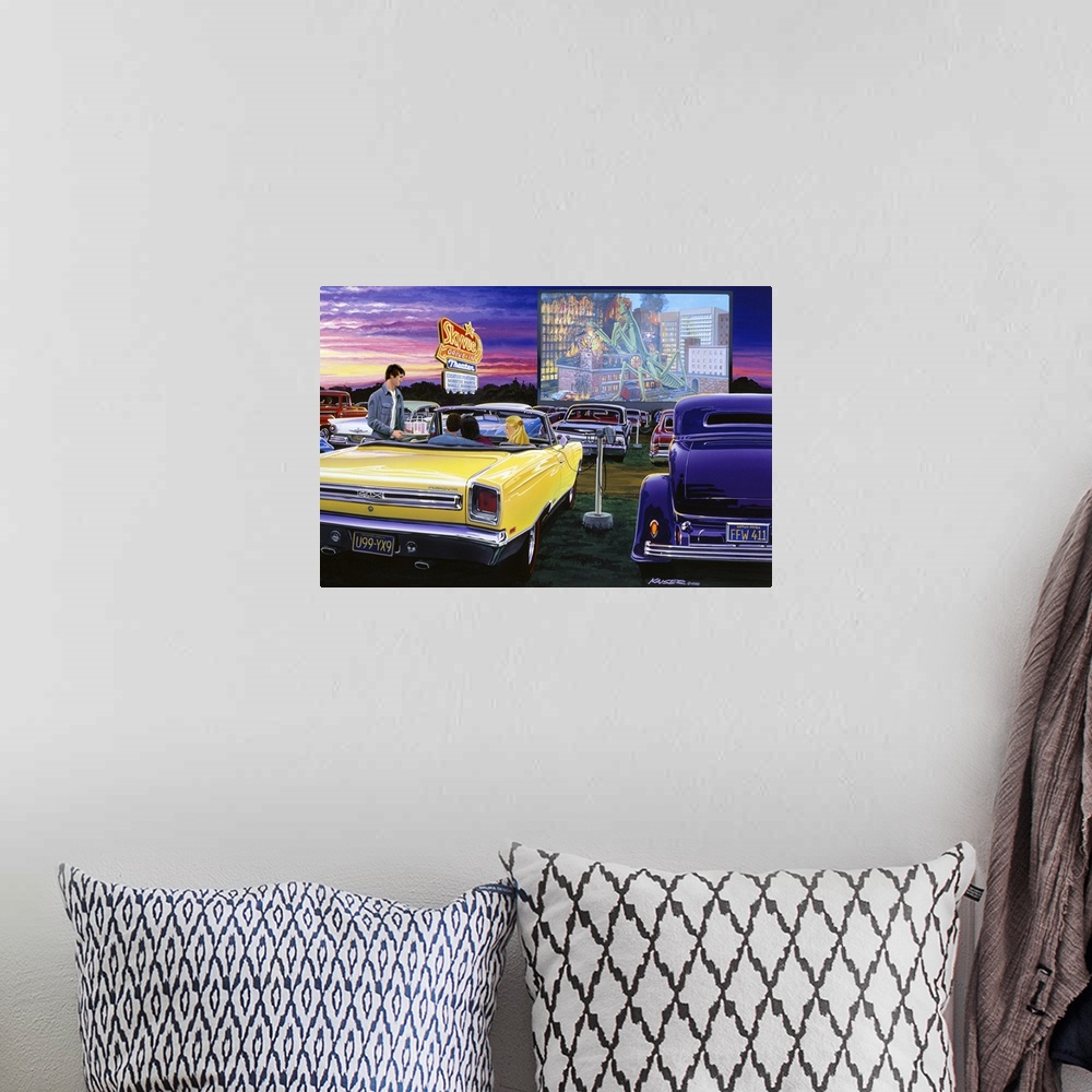 A bohemian room featuring Artwork of a drive in movie theater with classic cars parked in front of the screen and a sunset ...