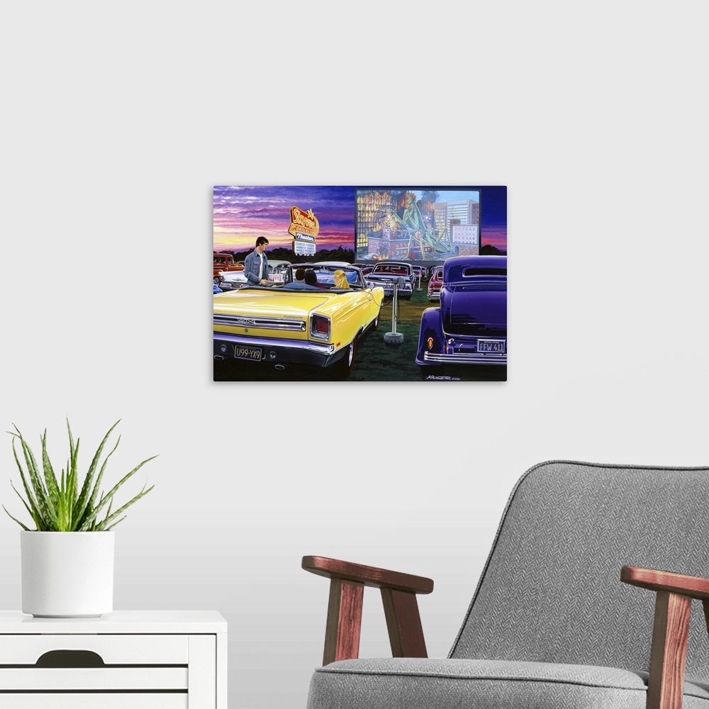 A modern room featuring Artwork of a drive in movie theater with classic cars parked in front of the screen and a sunset ...