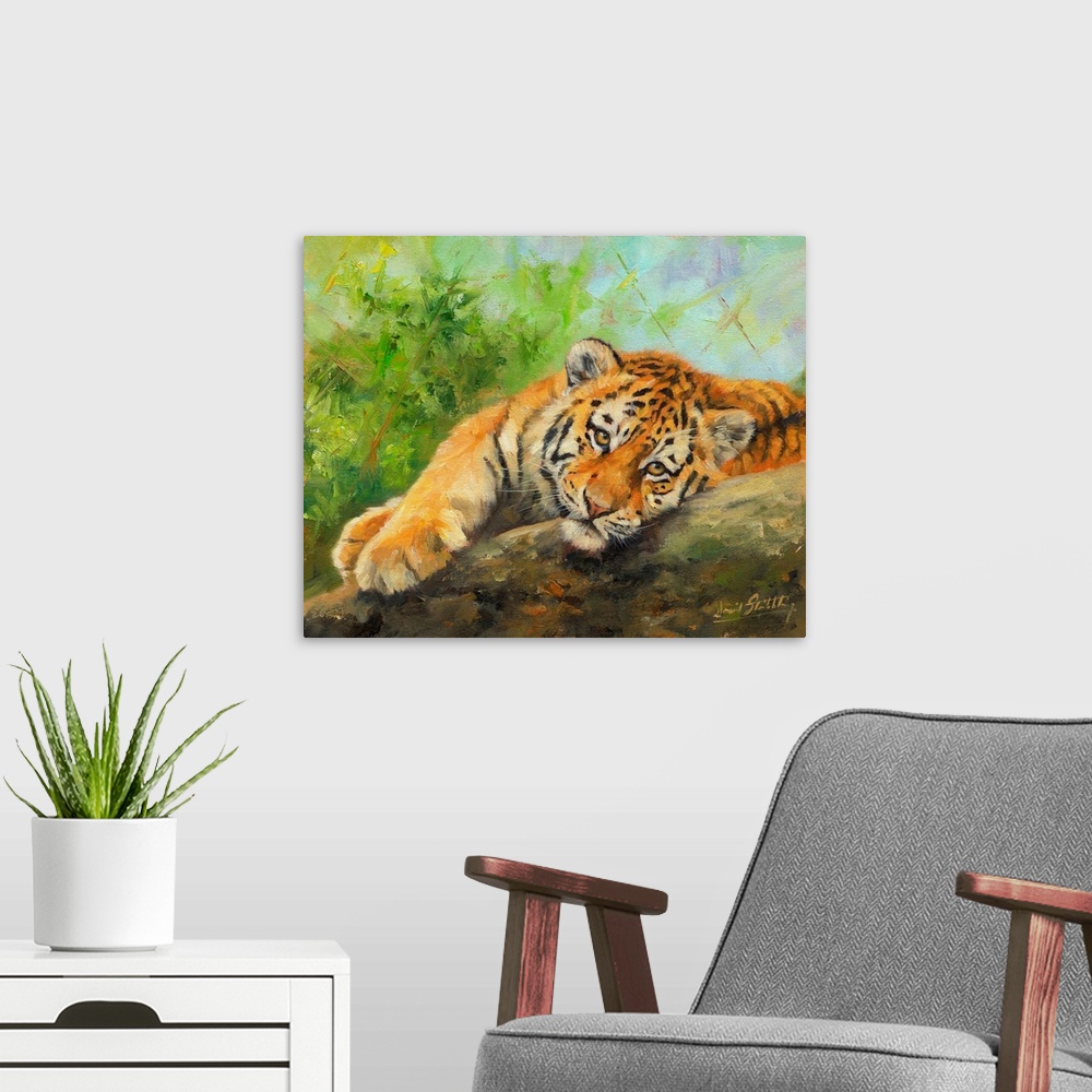 A modern room featuring Contemporary painting of a tiger cub lazily laying on a rock.