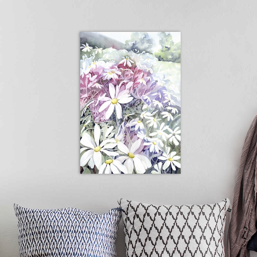 A bohemian room featuring Watercolor artwork of a field of flowers.