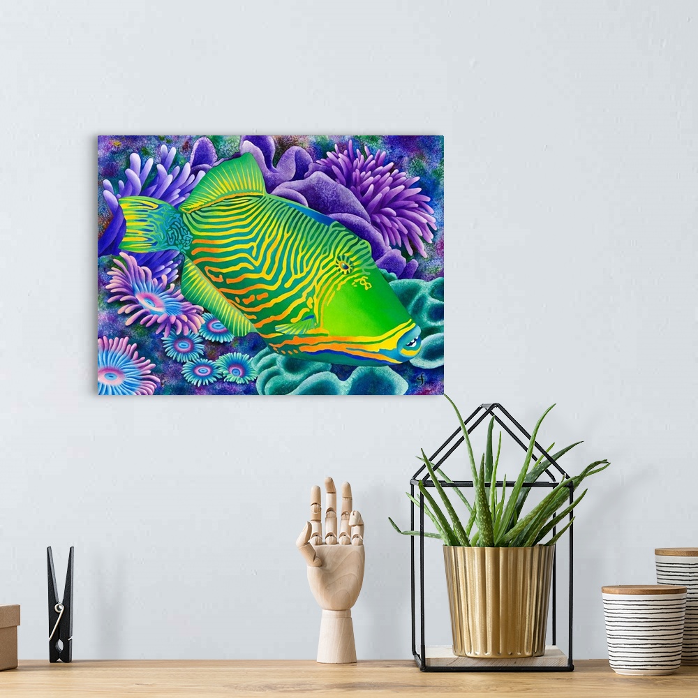 A bohemian room featuring Contemporary tropical themed artwork using bold vibrant colors.