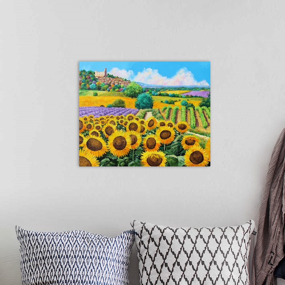A bohemian room featuring Painting of a countryside field of massive yellow sunflowers and rows of vineyards,