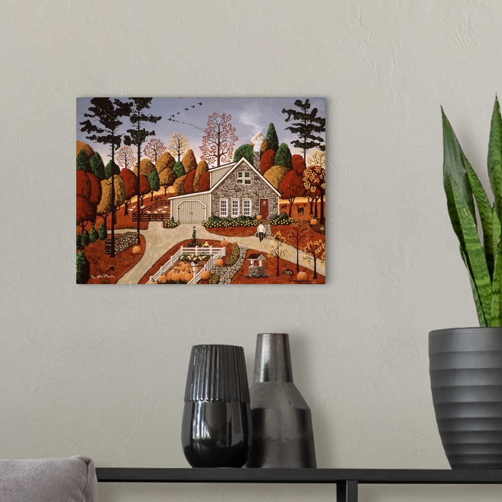 A modern room featuring Americana scene of a small house in autumn with several pumpkins.
