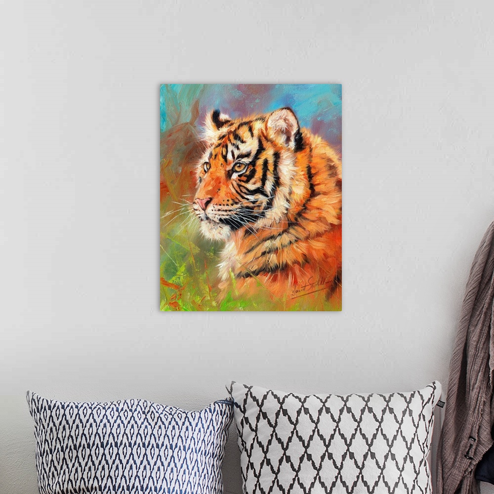 A bohemian room featuring Painting of a young Siberian tiger laying on the grass looking proud and majestic.