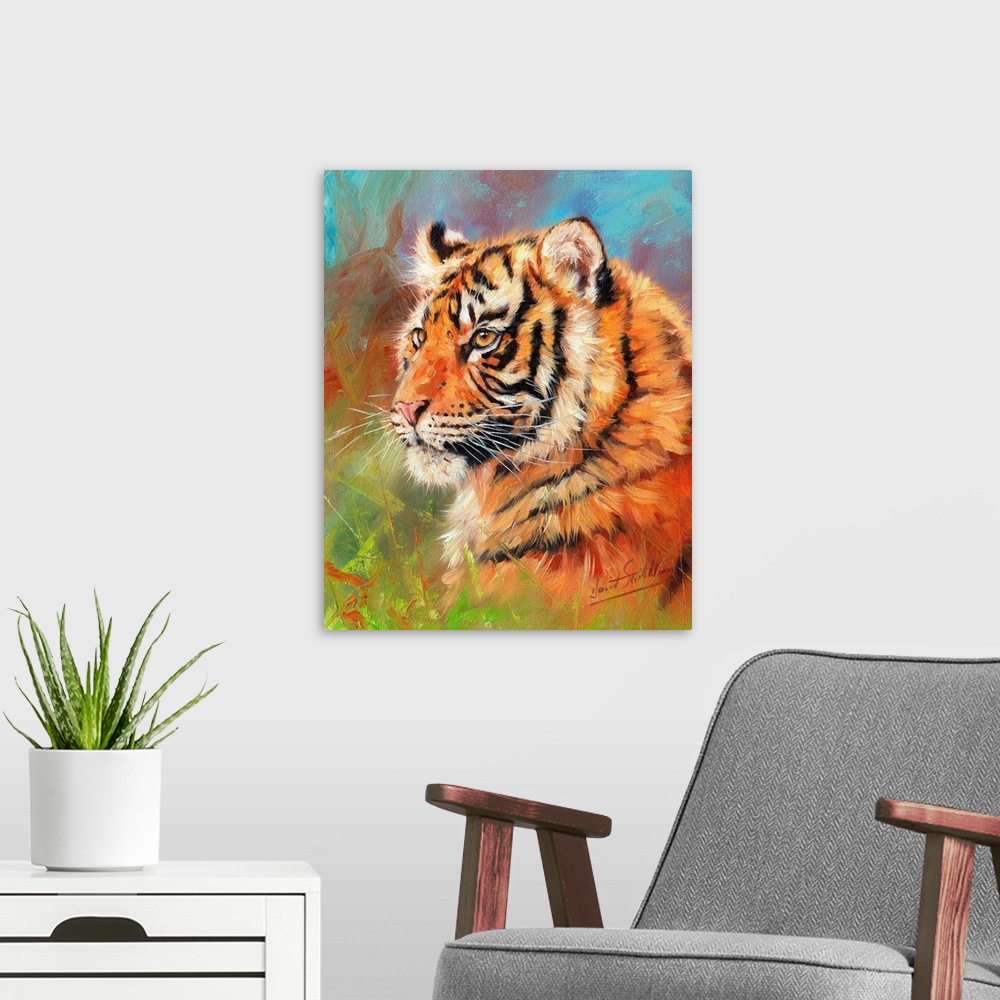 A modern room featuring Painting of a young Siberian tiger laying on the grass looking proud and majestic.