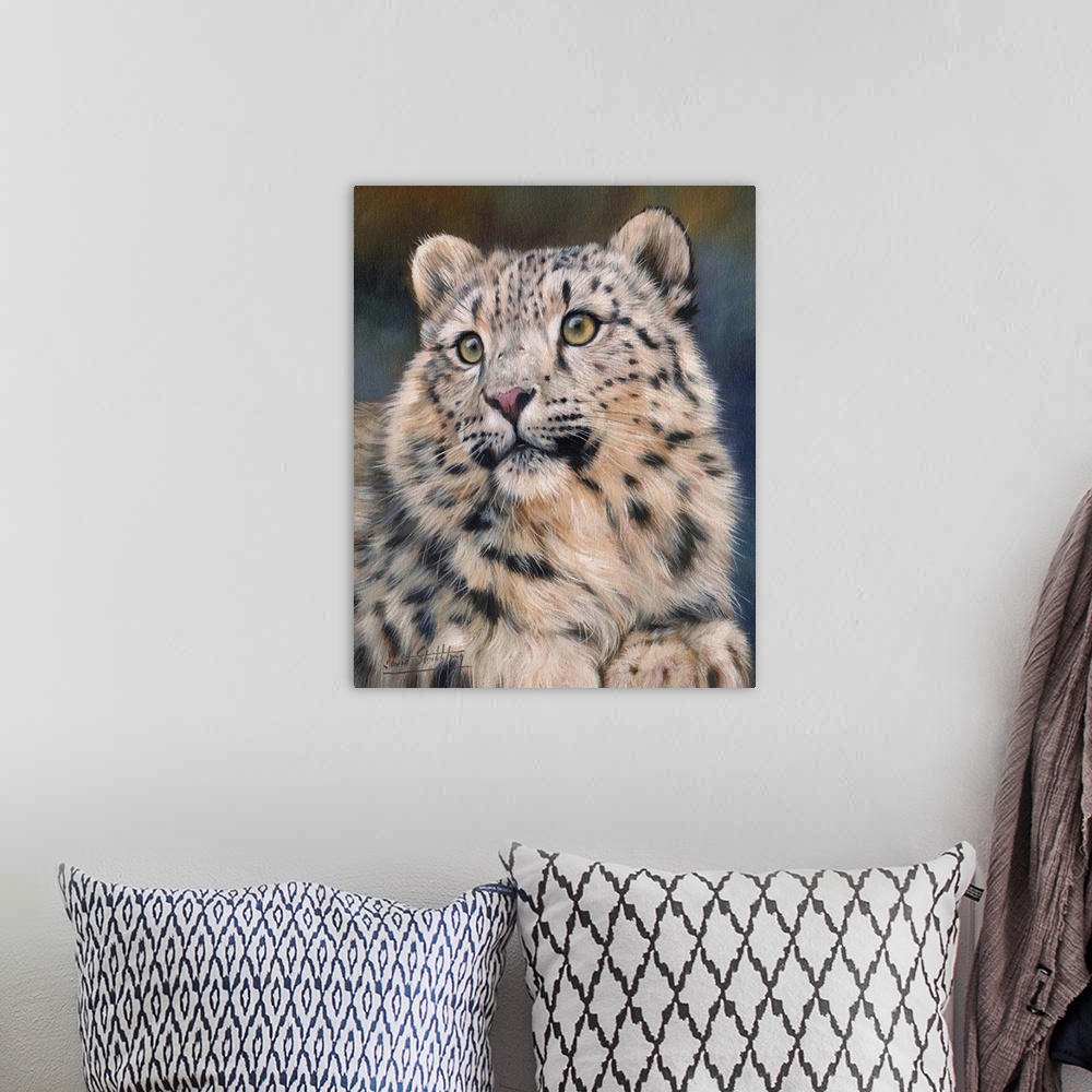 A bohemian room featuring Painting of a young snow leopard looking curiously at something.