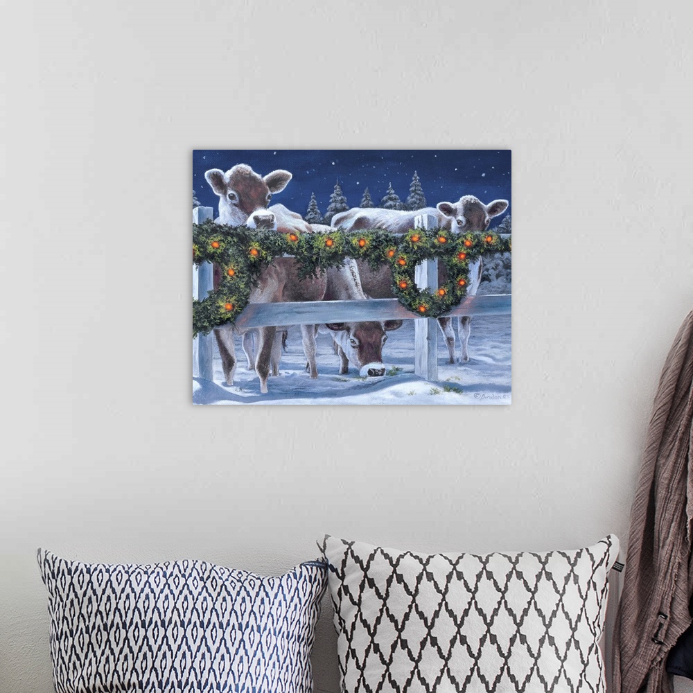 A bohemian room featuring Contemporary painting of cows standing behind a fence decorated for Christmas.