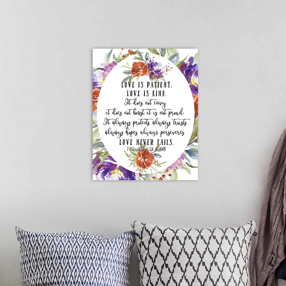 A bohemian room featuring Bible verse typography art in handlettered text, framed by blooming watercolor flowers.